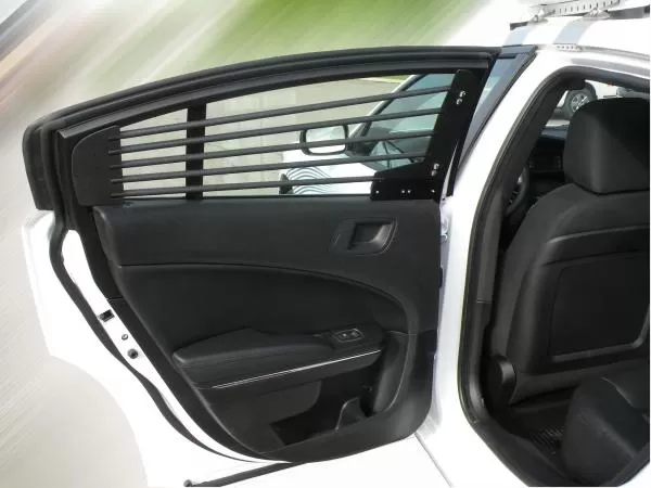 Rear door open on a Charger, showing the horizontal bar set fitted inside the door glass