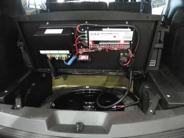 D&R 933-0092A cabinet subframe in a Ford Interceptor Utility with the electronics sub panel wired up
