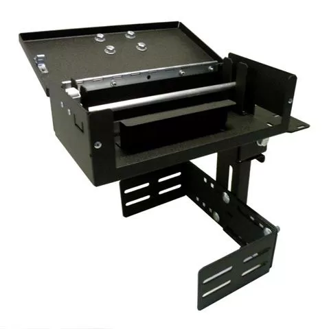 Printer armrest housing with the lid raised, showing the empty printer bay and paper spool rod inside