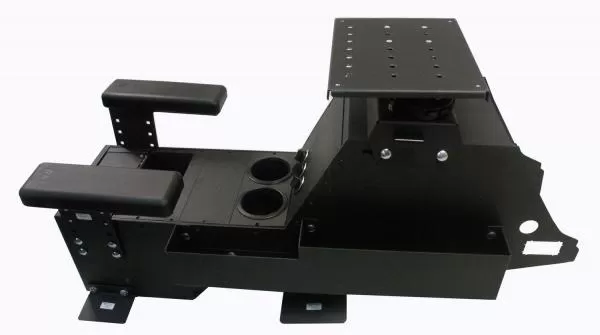 Console in side profile with staggered armrests, cup holders and the laptop plate over the rear deck