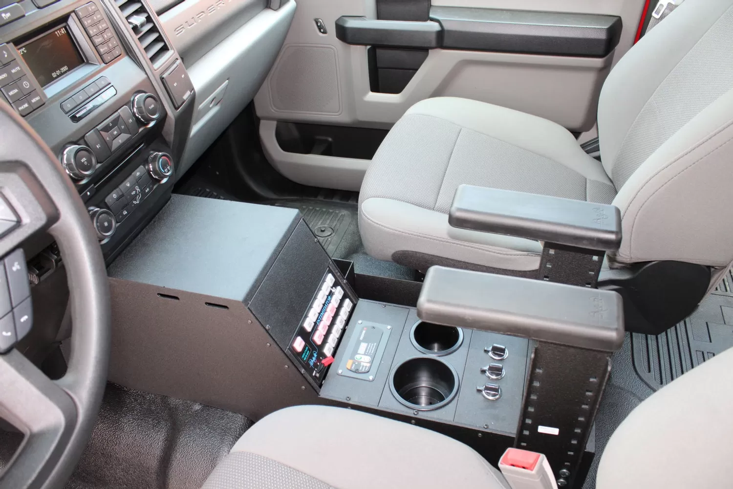 D&R 901-0135A console for the Ford F-150 and Super Duty, installed with dual armrests and breaker panel