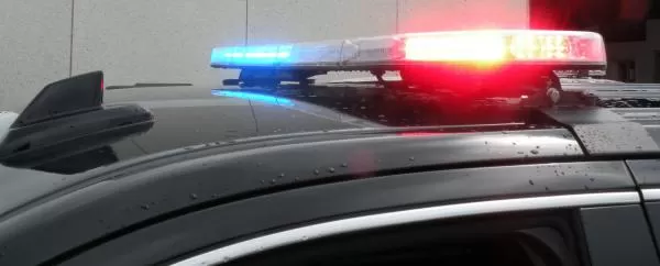 Low angle on the mounted bar with blue at the near end and red at the far end of the clear lens