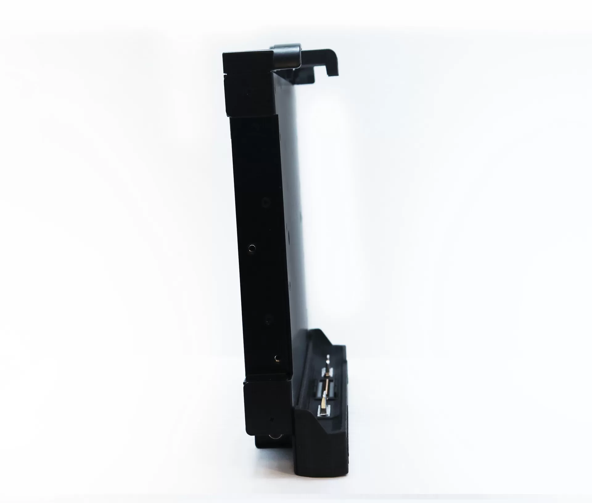 Edge-on profile showing how thin the unit is, with the top hook arm and the base connector