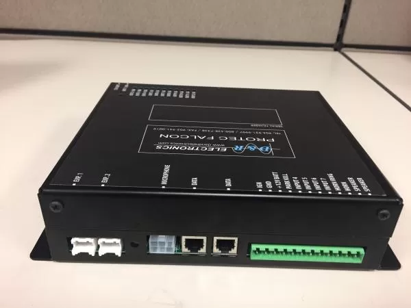 Black Protec Falcon control box with expansion, microphone and data jacks plus a green output terminal strip