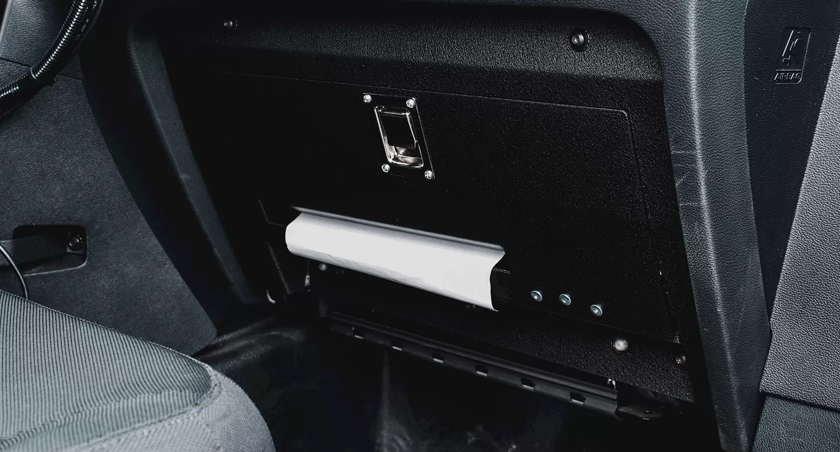 D&R 918-0051A glove box printer mount holding a Brother printer and paper roll, door dropped open