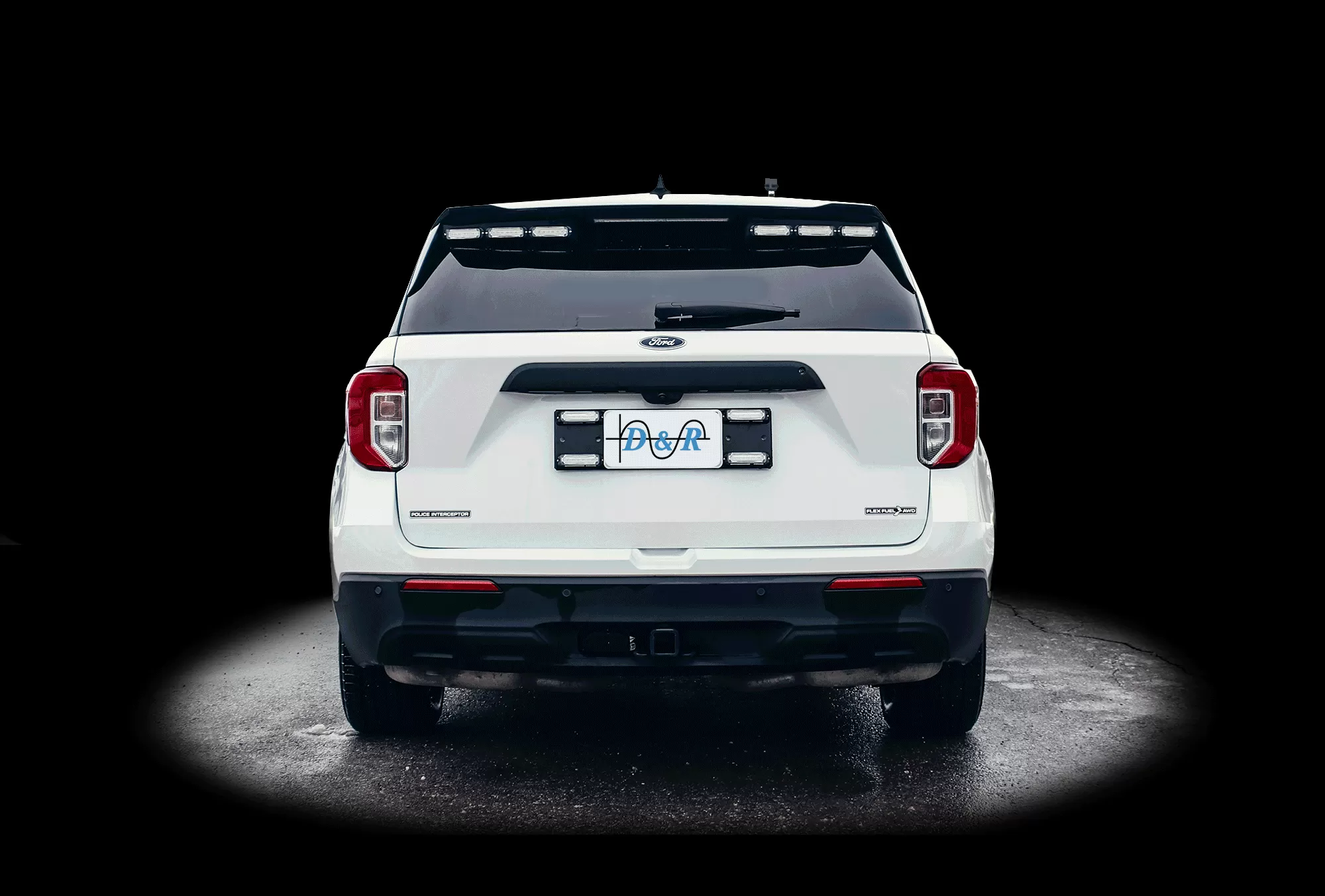 D&R GT2FTL-PIC-EXP20 exterior lightbar close-up, three clear-lens LED modules along the rear spoiler edge