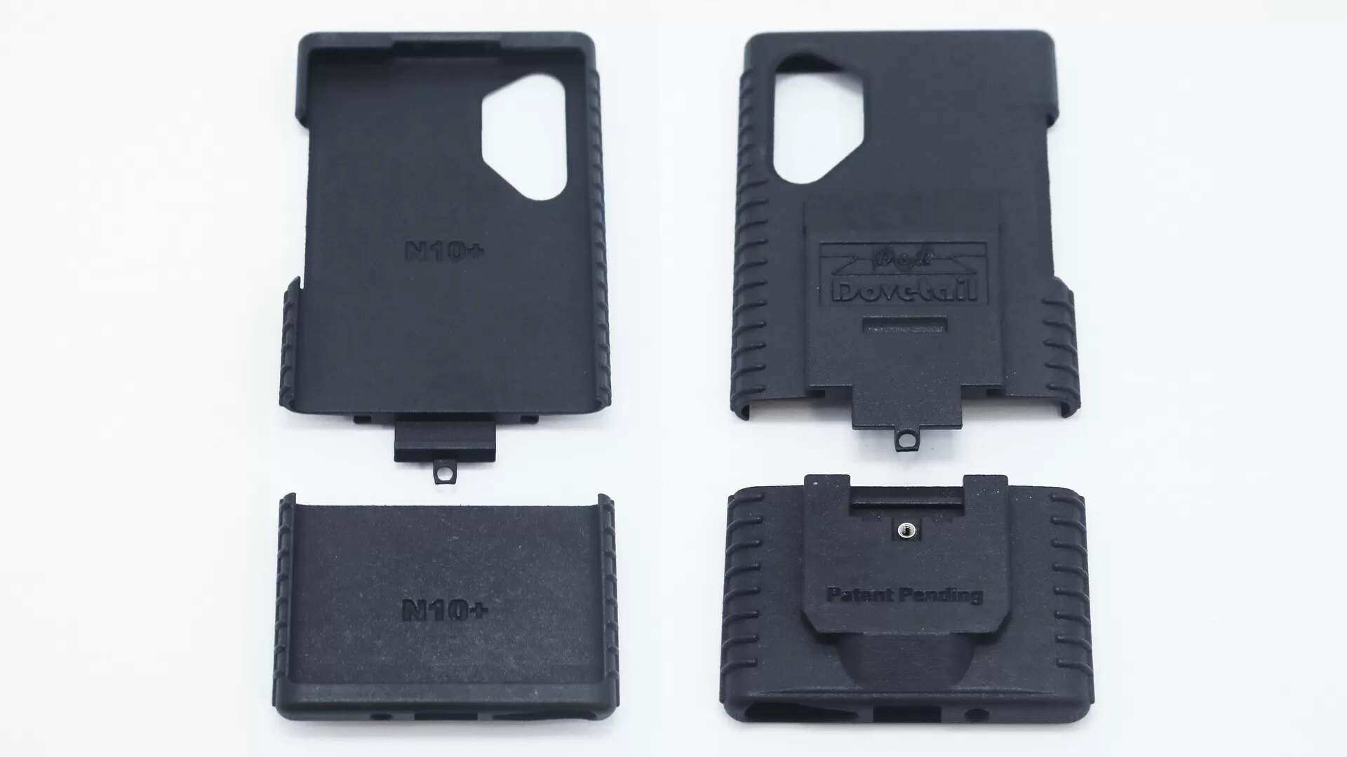 Both Note10+ shells with their lower N10+ caps detached, back of the outer piece marked Patent Pending