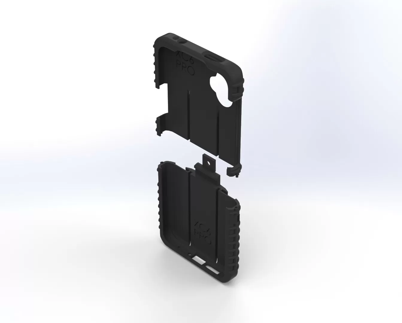 Both halves separated with their inner faces up, showing the alignment tab and screw boss