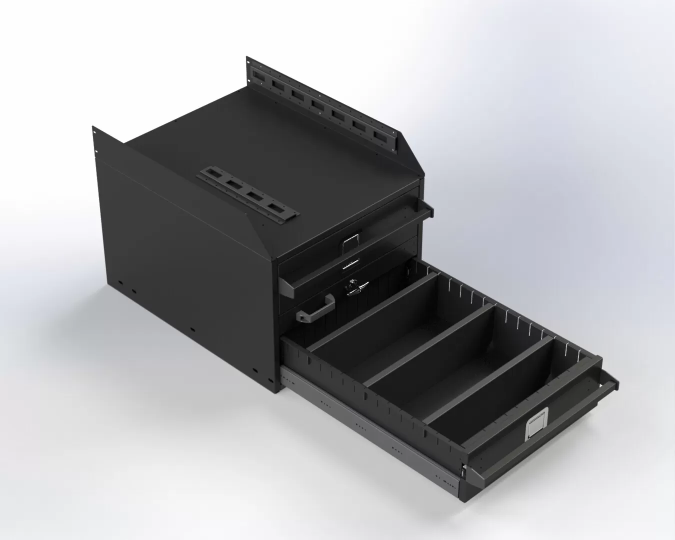 Open drawer fitted with steel dividers splitting the tray into separate compartments, paddle latch above