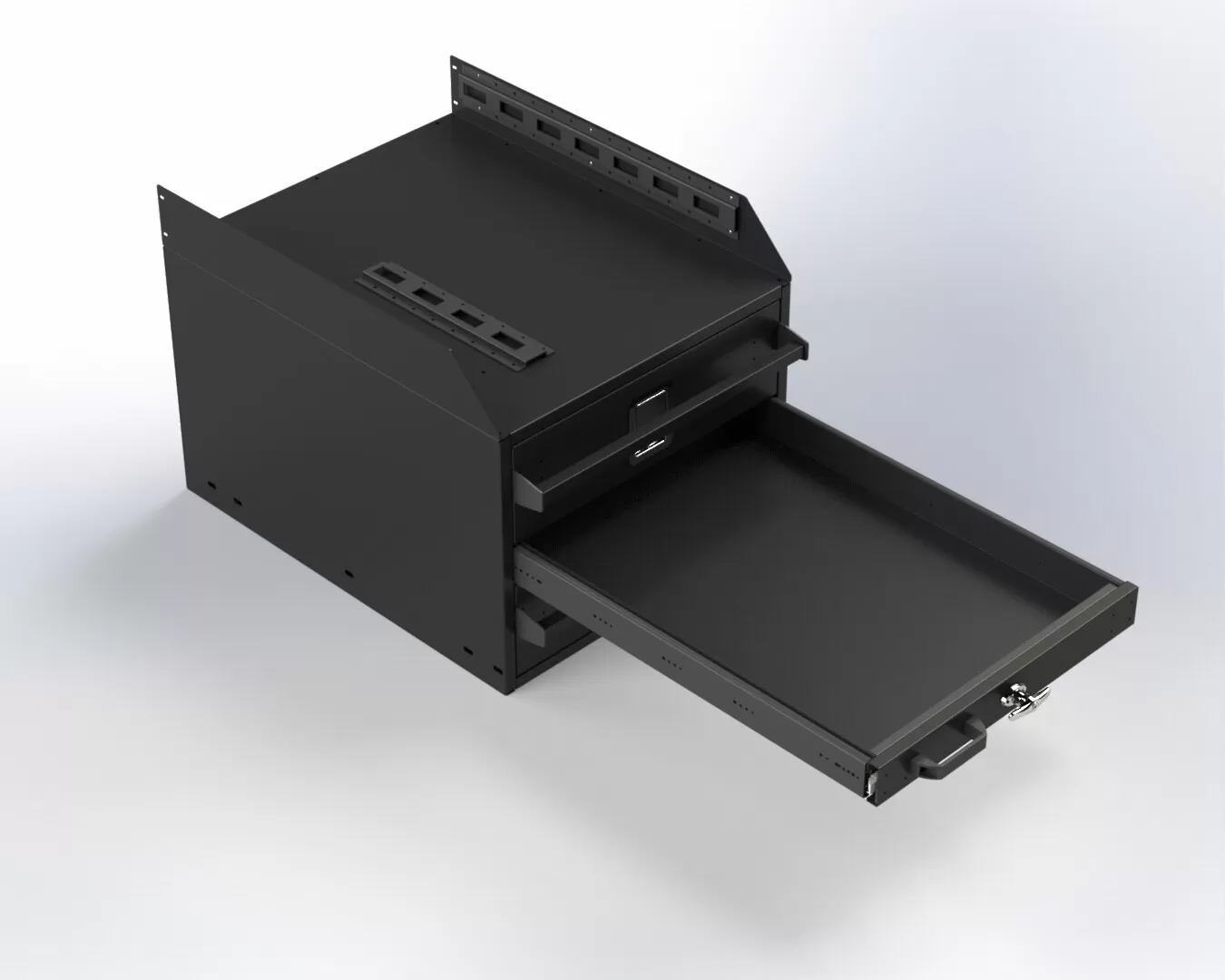Wide lower drawer of the cabinet pulled fully out, empty rubber-lined base riding on heavy-duty slides