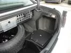 D&R 932-0014A trunk electronic mount door in a Dodge Charger beside the spare tire and equipment panel