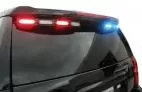 Wet Tahoe spoiler with the driver-side modules flashing red and the passenger side flashing blue