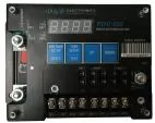 Faceplate with the cover off: voltage and time setup keys, fuse bank and IGN, GND, BATT terminal screws