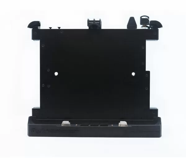 Front of the bare dock: flat tablet plate, top retaining clips, key in the lock and base connector