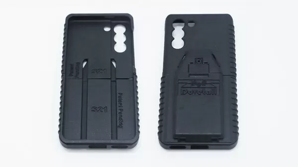 Both case halves side by side, inner face marked S21 and Patent Pending, outer face D&R Dovetail
