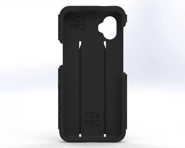 Inside of the two-piece case with XC6 PRO molded at the top and bottom of the phone cavity